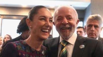 Claudia Sheinbaum y Luiz Inácio Lula da Silva sonríen durante un encuentro, simbolizando el fortalecimiento de la relación entre México y Brasil.
